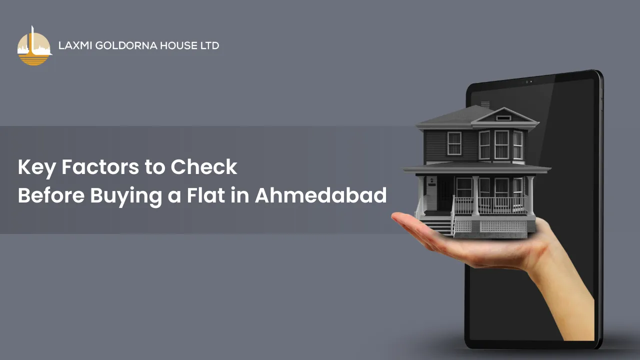 Hand holding a miniature house emerging from a smartphone screen, symbolizing digital property research and key factors to check before buying a flat in Ahmedabad.