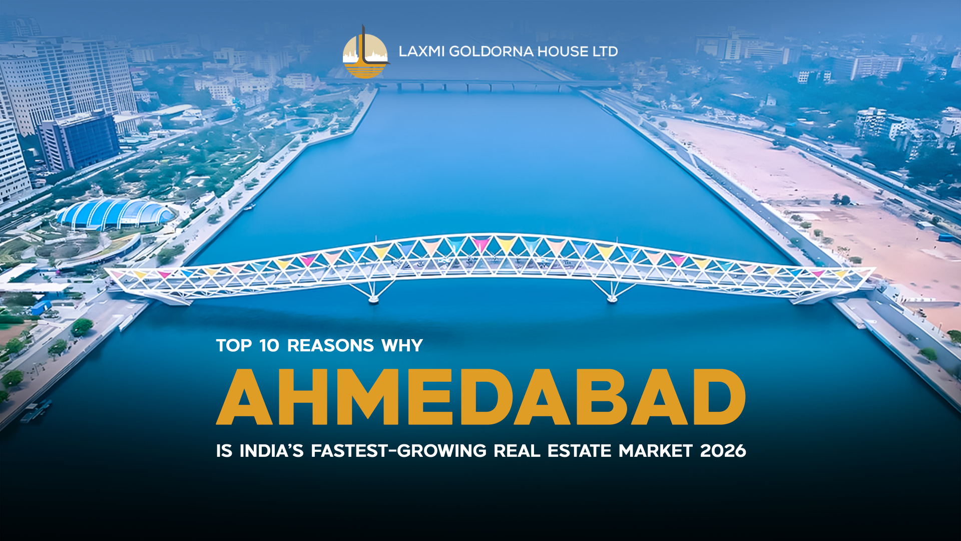 Aerial view of the colorful footbridge over the Sabarmati River in Ahmedabad, showcasing modern urban infrastructure, symbolizing the city's emergence as India’s fastest-growing real estate market in 2026.