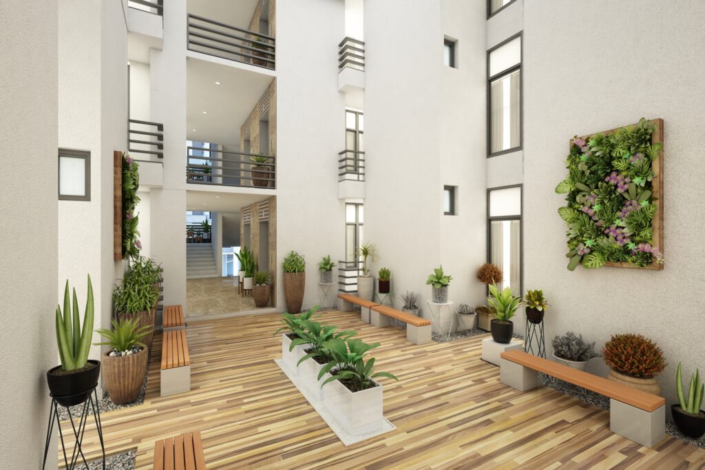Entrance lobby and landscaped garden in a completed Laxmi project in Ahmedabad