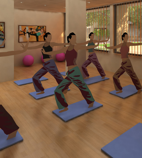 Women practicing yoga in a well-lit yoga room with wooden flooring at Laxmi Nivas, Ahmedabad, featuring wellness amenities in an affordable 1 BHK flat project under ₹20 lakh.