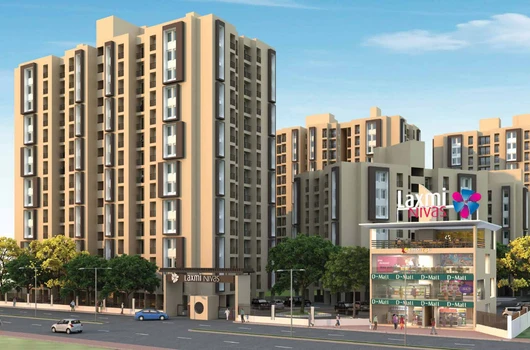 1 BHK flats in Ahmedabad featuring modern residential buildings, gated community entrance, landscaped surroundings, and affordable homes in a prime location by Laxmi Group