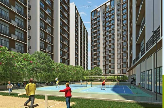 Flats in Narol Ahmedabad featuring 1 2 3 BHK apartments with landscaped courtyard, badminton court, green spaces, and modern residential buildings in a well-connected area