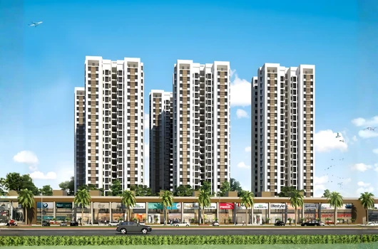 A stunning view of Laxmi Skycity's 22-storey towers in Nava Naroda, Ahmedabad, offering ready-to-move 3 and 4 BHK flats with world-class amenities like a swimming pool, gym, and clubhouse.