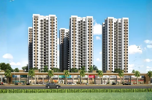 Front elevation of Laxmi Skycity in Nava Naroda near Nikol, showing ready-to-move 3 BHK flats in Ahmedabad Nikol with five high-rise towers, retail frontage, palm-lined landscaping, and modern family amenities.